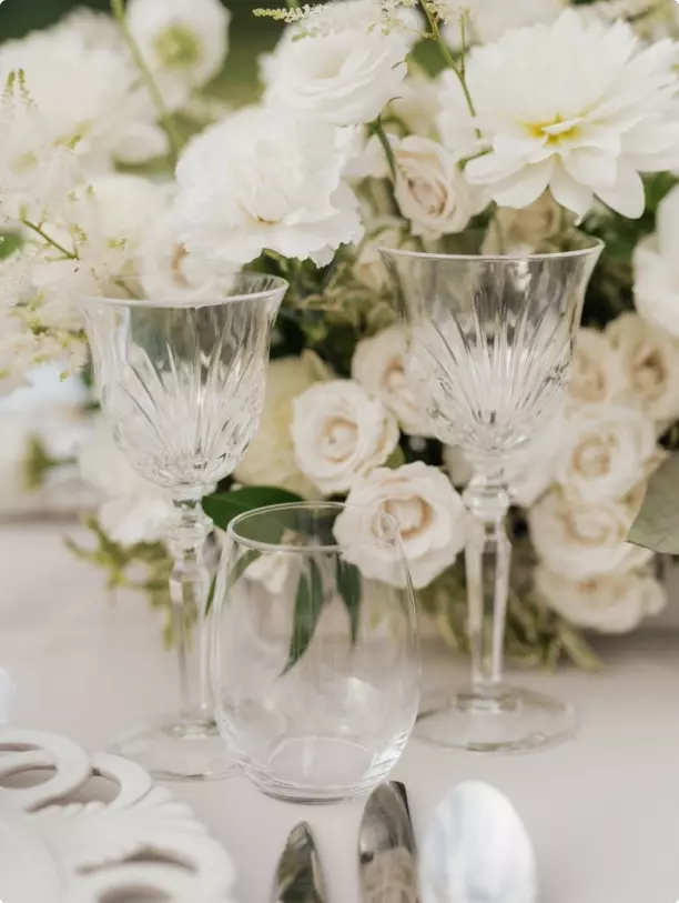 Elegant wedding aisle decorated with flower petals and arrangements