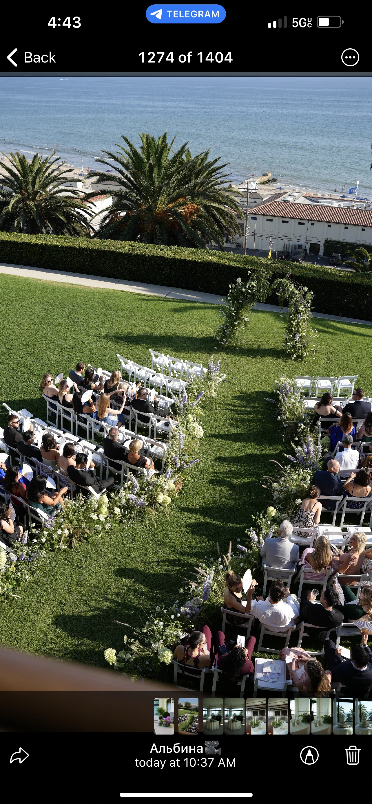 Luxury wedding floral centerpiece with white roses and greenery